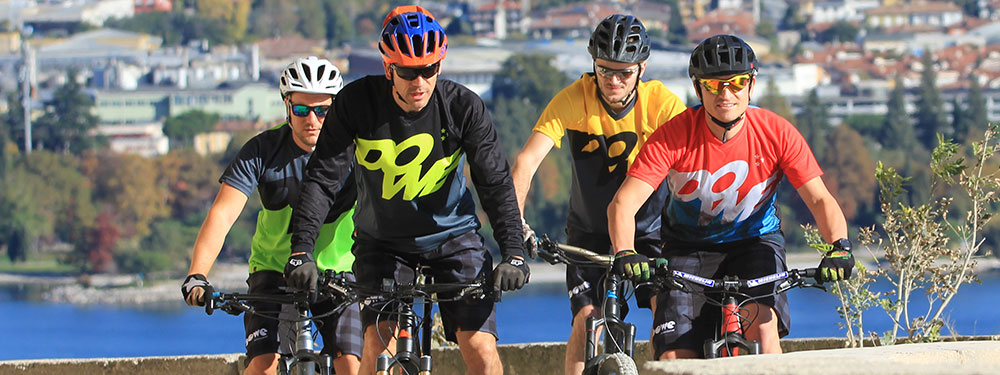 DOWE Sportswear Banner Image - Young men on mountain bikes wearing DOWE Sportswear